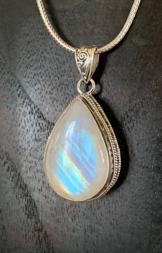 This fiery moonstone box pendant is absolutely stunning! Himalayan moonstone is very iridescent, glowing from many sides of the stone. Write a wish on a paper scroll, place inside, moonstone opens the crown chakra connecting to a higher feminine realm, relaying your wishes and prayers to be answered by the heavenly realm. Handmade, fair trade, sterling silver. 1.25”L x 0.75W Heavenly Realm, Winter Court, Paper Scroll, Handmade Fair, Crown Jewels, Crown Chakra, Himalayan, The Crown, Fair Trade