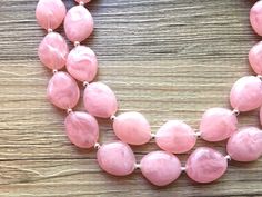 "A classic neutral that never goes out of style! Each bead is one of a kind, and has swirls of multi-toned pinks and white. Each bead has a \"stained glass\" look - very chic and elegant. This is part of our \"Magnolia Necklace Collection\". Love this style but prefer a different color? Check out the rest of the collection here: https://www.etsy.com/shop/PolkaDotDrawer/search?search_query=Magnolia Necklace is 16 inches long with a 4 inch extender chain. Earrings are 2\" drop. Bracelet is a 7\" s Pink Beaded Necklaces For Party, Pink Round Beaded Necklaces For Party, Elegant Pink Beaded Necklace With Gemstone Beads, Pink Single Strand Jewelry For Party, Pink Gemstone Beads Necklace For Wedding, Pink Round Bead Necklaces For Wedding, Elegant Pink Beaded Necklaces With Round Beads, Elegant Pink Beaded Necklace With Round Beads, Handmade Pink Necklace For Formal Occasions