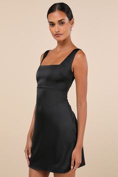 Everyone will want to dote on you when you strut through the room in the Lulus Truly the Cutest Black Satin Square Neck Mini Dress! Luxe woven satin shapes this sweet little dress with a classic square neckline, a darted bodice, and tank straps. Empire-style waist sits atop a figure-skimming A-line skirt that ends at a flirty mini hem. Hidden side zipper/clasp. Pair with your favorite stiletto heels for a chic look! Fit: This garment fits true to size. Length: Mid-thigh. Size medium Bust: Works Black Dresses Cocktail, Black Mini Formal Dress, Simple Hoco Dresses, Short Black Dress Outfit, Black Formal Dress Short, Movie Core, Black Hoco Dresses, Little Black Dress Cocktail, Black Satin Mini Dress