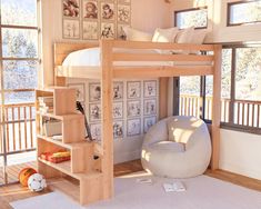 a bunk bed sitting in the middle of a bedroom next to a white chair and window