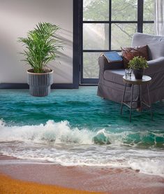 a living room with a couch, chair and potted plant on the floor in front of a window