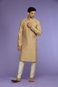 Mustard Yellow or Navy Abstract Printed Blended Kurta Set Traditional  Wear  Care Instructions: Dry Clean Blended Benarasi silk kurta with motifs & front potli placket. Top Details: Color- Mustard Yellow or Navy, Fabric - Blend slik Bottom Details Color - Cream, Style - free size Chudidar, Fabric -Dhupion Silk Package Include: Kurta and Pajama Additional Information : - As this Sherwani/Waistcoat/Kurta is stitched & made as per orders requested only, So there is NO RETURN & NO EXCHANGE on this p Transitional Gold Chanderi Kurta, Silk Long Sleeve Sherwani For Navratri, Ceremonial Chanderi Kurta With Cutdana, Ceremonial Chanderi Churidar With Dabka, Transitional Art Silk Kurta With Cutdana, Chanderi Bandhgala For Transitional Wedding Season, Festive Silk Bandhgala With Cutdana Detailing, Festive Silk Bandhgala With Cutdana, Ceremonial Long Sleeve Chanderi Sherwani