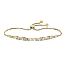 Sleek and lustrous, this diamond bolo bracelet is an upscale addition to her wardrobe. 10K gold Five sets of round-cut diamonds flanking a single baguette-cut diamond shine in between double bar stops along the bracelet 1 ct. t.w. of diamonds 9.0-inch adjustable wheat chain; bolo clasp Adjustable Classic Gold Bracelet For Anniversary, Adjustable Classic Gold Bracelet With Cubic Zirconia, Adjustable Yellow Gold Cubic Zirconia Tennis Bracelet, Elegant Adjustable Diamond Bracelet, Elegant Adjustable Diamond Bracelet With Accents, Elegant Diamond Tennis Bracelet With Adjustable Chain, Elegant Adjustable Diamond Bracelet For Anniversary, Timeless Adjustable Gold Tennis Bracelet, Formal Yellow Gold Diamond Bracelet With Adjustable Chain