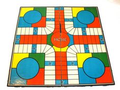 an old board game is shown on the table