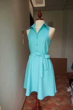 "*DHL shipping upgrade is available at check out process. Shipping part by DHL will take 3-6 days only. Production time may take around 2-3 weeks. If this is in rush you can convo us to make it sooner.:) ♥ Look for other color? Please convo, we can do. In pastel blue color. *Cap sleeve option is available. Please check last image of cap Sleeve style* ITEM DESCRIPTION New casual smart dress for all day to night. Shirt collar/ sleeveless top. Side hidden zipper. Beautiful fabric, swing skirt. Full Collar Sleeveless Top, Working Dress, Pastel Blue Dress, Working Dresses, Pastel Blue Color, Dress Shirt Dress, Blue Dress Shirt, Bridesmaid Party, Smart Dress