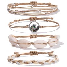 PRICES MAY VARY. Bracelets Pack: This four-piece pack features a cowrie shell charm bracelet, a mother of pearl wave charm bracelet, a simple friendship bracelet and a bead multi strand bracelet. Trendy Bracelets: Set on a simple string band, each bracelet includes a cutout wave charm. It nails that effortless surf style you’ll want to wear all summer. Wax Coated Strings: Wax-coated ropes will not fade or disintegrate when they come into contact with water. Boho Jewelry: Those braid bracelets pe Shiny Bracelets, Friendship Bracelets Easy, Surf Jewelry, Handmade Friendship Bracelets, String Bracelets, Boho Wrap Bracelet, Wave Bracelet, Trendy Bracelets, Puka Shell