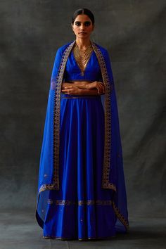 Electric blue lehenga, accentuated with placement embroidery in marori, zardozi and dori work. Paired with a blouse and dupatta.
Components: 3
Pattern: Embroidery
Type Of Work: Marori, Zardozi, Marori
Neckline: Deep V Neck
Sleeve Type: Half Sleeves
Fabric: Habutai Silk: Lehenga and Blouse, Organza: Dupatta
Color: Blue
Other Details: 
Attached inner lining
Zardozi embroidered border dupatta
Note: Necklace worn by the model is not for sale
Occasion: Sangeet - Aza Fashions Electric Blue Lehenga, Blue Indian Outfit, Silk Lehenga Designs, Blouse Organza, After Wedding Dress, Lehenga And Blouse, Blue Blouse Designs, Dori Work, Placement Embroidery