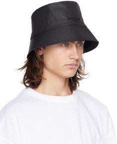 Nylon taffeta bucket hat in black. · Logo embroidered at face · Quilted brim · Logo-engraved hardware at side · Full cotton twill lining Supplier color: Black Flat Brim Nylon Hat For Streetwear, Nylon Flat Brim Hat For Streetwear, Summer Nylon Streetwear Hats, Summer Streetwear Nylon Hats, Black Nylon Bucket Hat, Black Embroidered Logo Bucket Hat For Summer, Black Nylon, Black Logo, Black Nylons