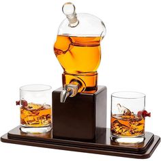 two glasses on a tray with an ice dispenser