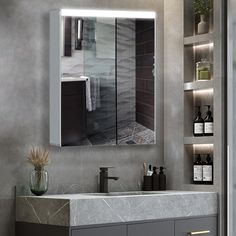 a bathroom with a sink, mirror and shelving unit in the corner next to it