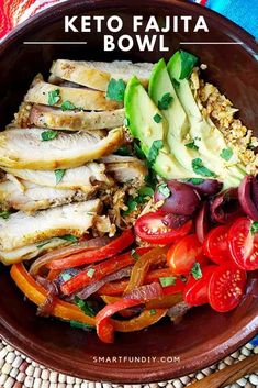 keto fajita bowl with chicken, peppers, avocado and tomatoes