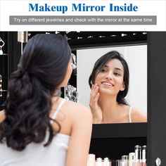 a woman is looking at her reflection in the mirror