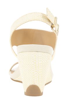 With a cushy insole, this platform sandal offers lasting comfort to be a weekend wardrobe favorite. 3 1/4" heel; 1" platform Synthetic upper and lining/rubber sole Imported Fabric Wedge Sandals With Cushioned Footbed And Round Toe, Beige High Heel Wedge Sandals In Synthetic, Beige Fabric Open Toe Sandals, Wedge Heels With Removable Insole, High Heel Synthetic Wedge Sandals With Arch Support, Beige Synthetic Wedge Sandals With 4-inch Heel, Synthetic Wedge Heels With Textured Footbed, High Heel Synthetic Wedge Sandals With Textured Footbed, Fabric Wedge Heel Sandals With Cushioned Footbed