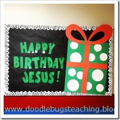 a blackboard with a green and red present on it that says happy birthday jesus