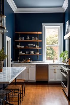 a kitchen with blue walls and wooden floors