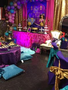 a room filled with lots of purple and blue decorations