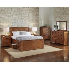 a bedroom scene with focus on the bed and dresser