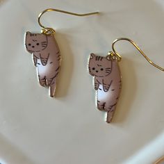 Cat Earrings Made With Enamel And Gold Plated Earwire. *Cat 1” *Gold Plated Earwire Cute Brown Dangle Earrings, Sand Dollar Earrings, Purple Dangle Earrings, Murano Glass Earrings, Engagement Earrings, Starfish Earrings, Pumpkin Earrings, Loop Earrings, Fish Hook Earrings