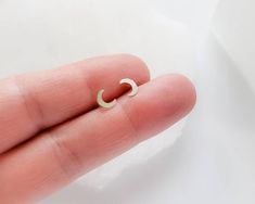 Tiny crescent moon studs. Perfect everyday earrings that complement any style!• T H E • D E T A I L S • • All components are solid 14 karat Gold• Crescent moon measures 5mm x 6mm• Thoughtfully packaged & ready for gift giving!• Handmade, just for you, in our sunny California Studio• Our 365 Guarantee: Our jewelry is guaranteed for 1 year after purchase date against defects.• Your jewelry is always beautifully and carefully wrapped in a sturdy, navy blue box accompanied by our signature "Stud Nickel-free Crescent Cartilage Earrings As Gift, Nickel Free Crescent Cartilage Earrings Gift, Moon Earrings Gold, Gold Earrings Stud, Tiny Gold Earrings, Gold Crescent Moon, Crescent Moon Earrings, Stud Earrings Gold, Moon Studs