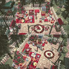 an aerial view of a christmas table setting in the middle of a yard with red and green decorations