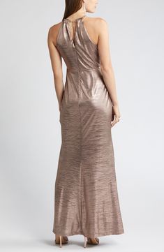 Steal the show in this glamorous metallic gown designed with a golden chainlink neckline and sleek cutaway shoulders. 56" center front length (size 8) Sleeveless, with cutaway shoulders Lined 100% polyester Dry clean Imported Metallic Gown, Vince Camuto, Size 16, Dry Clean, Sleek, Nordstrom, Twist, Design