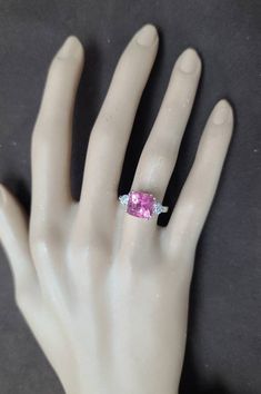 GORGEOUS  vintage 14K WHITE GOLD  engagement ring natural pink tourmaline radiant shape  ,center set natural pink tourmaline radiant shape weight 3.86carat.size 9x8.7mm very nice raspberry color ,nice luster, very lively ,nice cut. clean.sparkly tourmaline. side two natural round cut   diamonds total weight 0.55ct. Size 4mm H-SI1 ring size 5.5Resizable Appraisal available Retail value $5750 net. Pink Emerald Cut Sapphire Ring In Fine Jewelry Style, Pink Emerald Cut Sapphire Ring Fine Jewelry, Fine Jewelry Pink Sapphire Ring With Emerald Cut, Fine Jewelry Pink Emerald-cut Sapphire Ring, Pink Emerald Cut Tourmaline Jewelry, Pink Emerald-cut Tourmaline Jewelry, Fine Jewelry Pink Radiant Cut Rings, Pink Morganite Emerald-cut Jewelry, Pink Morganite Emerald Cut Jewelry