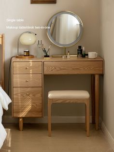 a bedroom with a vanity, stool and mirror