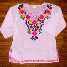 Brand New Blusa Mexicana. Beautiful Embroidered Details. Tag Says One Size Fits All But It Actually Is A Medium To Large Size White 3/4 Sleeve Tops For Vacation, White Floral Embroidered 3/4 Sleeve Blouse, White Blouse With Floral Embroidery 3/4 Sleeve, Multicolor Embroidery Long Sleeve Vacation Tops, White Embroidered Blouse With 3/4 Sleeves, Summer Embroidered Tops With 3/4 Sleeves, Summer Tops With Floral Embroidery And 3/4 Sleeve, Casual Embroidered Top With 3/4 Sleeves For Spring, Multicolor Embroidered Tops With 3/4 Sleeve