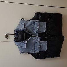 Bnwot Puffer Denim Vest With A Shiny Like Material Very Cute In Person It Can Tie And Cinch At The Waist. There's No Size Tag!! I Purchased One Size Fits Most But In My Opinion It Can Fit Up To Size Large! Comes From A Clean, Smoke And Pet Free Home!! Trendy Black Cotton Denim Vest, Trendy Black Patchwork Denim Jacket, Black Denim Vest With Pockets For Spring, Spring Black Denim Vest With Pockets, Trendy Black Denim Vest For Streetwear, Trendy Patchwork Denim Vest, Trendy Black Denim Vest For Winter, Trendy Black Denim Winter Vest, Black Denim Vest With Pockets For Winter