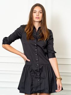 If you are between sizes, we recommend sizing up due to the shorter length of the dress.

 A feminine drop waist shirt dress with our signature No Gape® button up technology.

 Rochelle Behrens reimagined how shirts and dresses should fit and feel. Our patented No Gape® button technology, seamlessly designed into every shirt and shirtdress we design, eliminates blouse gape. Finally say bye bye blouse gape, hello The Shirt.  

  
 * 75% Cotton, 20% Nylon, 5% Stretch 
 * Made in Portugal 
 * Power Michaela Pratt, Mid Twenties, New Frock, Winter Skirts, Chic Over 50, A Clothes Horse, Event Outfit, Sail Boat, Dropwaist Dress