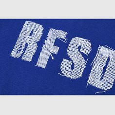 the letters are made up of white thread on a blue t - shirt that says, yes