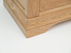 a close up of a wooden dresser drawer