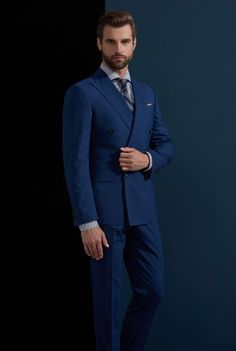 This blue suit for men or women is an amazing addition to any new suit wardrobe and a great enhancement to established suit wardrobes. With the neutral and bold blue color, you will not only be seen as a leader, but you will be able to partner this suit with multiple color options for any season and any situation. This is a piece that everyone should have in their collection. Like this look, but want to make some changes? Chat with a stylist or book an appointment. FREE SHIPPING ON ORDERS OVER $199 COLOR Blue COMPOSITION 100% Wool YARN COUNT Super 100s WEIGHT 295g FABRIC STYLE Solid OCCASION Business/Casual Elegant Blue Double Breasted Suit For Semi-formal Occasions, Blue Three-piece Suit With Notch Lapel For Business Casual, Tailored Blue Suits With Suit Collar, Fitted Blue Double Breasted Suit For Business Casual, Blue Single-breasted Tuxedo For Workwear, Blue Notch Lapel Tuxedo For Work, Business Blue Single Breasted Tuxedo, Blue Single Breasted Tuxedo, Blue Double-breasted Blazer For Formal Occasions