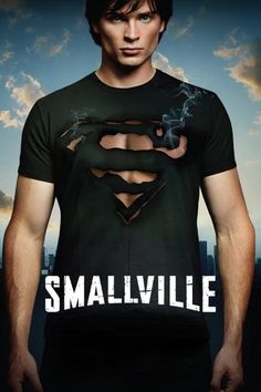 a man in a black shirt with a superman symbol on his chest and the words, destined