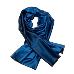 Discover the timeless elegance of our woven silk scarf in denim blue on the front and blue on the back. This unique two-tone design adds a sophisticated and versatile touch to your look. The scarf is an exclusive accessory that harmoniously combines both shades and is therefore perfect for various occasions. With generous dimensions of 70 cm x 180 cm, it offers flexible carrying options. Wrap it elegantly around your shoulders for a touch of glamor or drape it casually around your neck for relax Luxury Blue Silk Scarves, Luxury Blue Silk Scarf, Elegant Blue Satin Silk Scarf, Elegant Blue Silk Scarf For Formal Occasions, Elegant Blue Silk Scarf For Evening, Short Fringe, Capri Blue, Silk Shorts, Shawls And Wraps