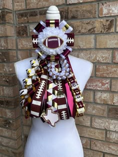 a mannequin wearing a football scarf