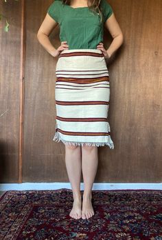 "This beautiful cotton blanket skirt is in excellent vintage condition with virtually no flaws to be seen. We adore the small tassel fringe along the bottom and the side slits, measuring 7 inches on either side. This skirt has a zipper closure, and is a linen cotton blend. It sits pretty high waisted on our model, who is between a women's small and medium, and is about 5'8\". 29\" waist 25\" long" Bohemian Lined Pencil Skirt, Tassel Fringe, Woven Blanket, Cotton Blankets, Cropped Sweater, Chunky Knit, Pencil Skirt, High Waisted Skirt, Womens Skirt