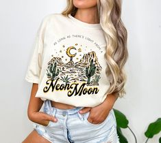 Neon Moon Shirt - Comfort Colors Shirt, 90s Country Shirt, 90s Music Tee, Brooks Dunn Shirt, Western Graphic Tee, Western Shirt Women, 2024 ϟ High quality, direct-to-garment ink printed. ϟ ✦ Fit + Quality ✦ These UNISEX Comfort Colors tees are like a well-loved favorite - they wash well and are easy to wear. ✦ 100% ringspun cotton ✦ Preshrunk, soft-washed, garment-dyed fabric ✦ Twill taped shoulder-to-shoulder ✦ Set-in sleeves ✦ Double-needle stitched sleeves and bottom hem ✦ 1" ribbed collar wi Spring Band Merch Shirt With Relaxed Fit, 90s Inspired Pre-shrunk Summer T-shirt, 90s Style Summer Shirt With Funny Print, Y2k Relaxed Fit Shirt For Spring, Y2k Style Relaxed Fit Spring Shirt, 90s Inspired Streetwear Summer Shirt, 90s Inspired Summer Streetwear Shirt, Western Shirt Women, Distressed Band Tee