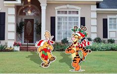 two cartoon characters standing in front of a house