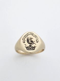 "ABOUT: This wonderful design was cast from an original Edwardian solid gold signet ring from Birmingham, UK, featuring a winged pegasus and the motto \"Forti Nihil Difficile\", which loosely translates to \"for the brave, nothing is impossible\" or \"nothing is too difficult for the strong/brave\".  This is a motto that has graced both the Fox and Disraeli family crests, according to Fairbairn's book of crests of the families of Great Britain and Ireland, c.1905. Well known from Greek mythology Luxury Anniversary Signet Ring With Coat Of Arms, Family Crests, Metal Workshop, Nothing Is Impossible, Signet Ring Men, Edwardian Style, Birmingham Uk, Gold Signet Ring, Edwardian Fashion