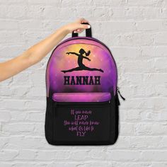 "Thanks for stopping by What the Frog Design Company! Our personalized pink and black gymnastics backpack makes a great gift for that special gymnast. Visit our homepage https://www.etsy.com/shop/WhattheFrogDesignCo/  to see all the product options we have available, and make sure to click the 'heart' icon to get updated when we list more new interesting designs.  Features: - 100% polyester - Lightweight and waterproof - Adjustable shoulder straps - Custom name tag sewn inside - 11.81\"L x 5.12\ Pink Backpack For Gym, Purple Sports Backpack For Back To School, Purple Backpack For Sports And Back To School, Gymnastics Bags, Mom Bag, Gymnastics Mom, Sports Backpack, Gymnastics Gifts, Personalized Basketball