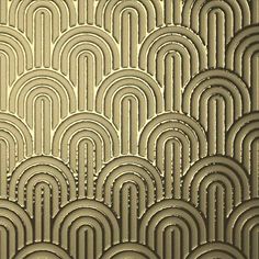 an abstract gold wallpaper pattern with wavy lines and circles on it's surface