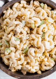 macaroni and cheese salad in a wooden bowl