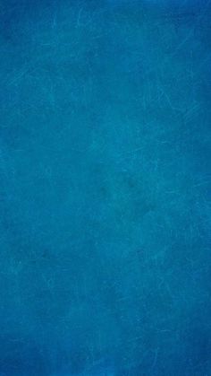 an image of a blue background that looks like it has been painted