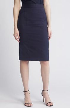 Bring modern style to your work-to-weekend wardrobe in this pencil skirt crafted from virgin wool with a neat grid pattern. 25 1/2" length Hidden back-zip closure 100% virgin wool Dry clean Made in Portugal Hugo Boss/BOSS/HUGO has received the Fair Labor Association accreditation, which signifies that the company has effective systems and procedures in place to successfully uphold fair labor standards throughout its supply chains, including strategies and tools to address and improve working con