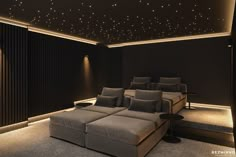 a room with a couch and some lights on the ceiling