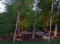 an aerial view of a wooded area at night