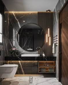 a modern bathroom with marble walls and flooring