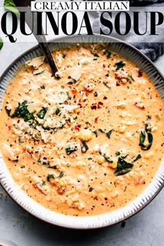 a bowl of creamy italian quinoa soup with spinach and parmesan cheese