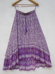 "ITEM DESCRIPTION hi low style purple floral printed cotton long maxi skirts - picnic wear bohemian women long maxi skirts Material: 100% cotton voile soft crinkled fabric Length: - 38 inch long Waist :-28.00 inch full (14 inch half) 28 inch relaxed can stretch up to 50 inch Size: free size (fit to all) PRODUCT NAME: - Long Women Maxi skirts Ladies Vintage Long skirts Company Return Policy: Please write for more information to my email directly CHOOSE \"ASK SELLER QUESTION \" payment policy:- we Summer Printed Cotton Skirt, Spring Bohemian Flowy Maxi Skirt, Flowy Bohemian Maxi Skirt For Spring, Bohemian Floral Print Maxi Skirt For Spring, Summer Flowy Boho Print Maxi Skirt, Beach Cotton Maxi Skirt, Cotton Maxi Skirt For Beach, Bohemian Floral Print Maxi Skirt For Beach, Bohemian Printed Skirt For Spring